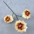 Detailed close-up shot of artificial champagne rose flower branch featuring three blooming heads. - Coffee