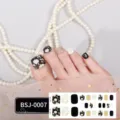 Semi-cured gel toe nail wraps with black floral and gold glitter design for women pedicure art. - BSJ-0007