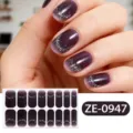 Detailed view of dark purple gradient nail wraps featuring shimmering silver glitter accents. - ZE-0947 / Press-on Nails and Nail File