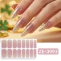 Vista detallada de pegatinas de uñas con degradado de purpurina rosa y oro y mano. - ZE-0993