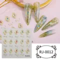 Close-up detail of 5D relief golden baroque gemstone nail art stickers with crystal rhinestones. - RJ-0012 / 60*60mm Bare Sheet