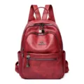 Classic red oil wax leather women backpack with multiple zipper pockets and stylish kangaroo logo. - Red