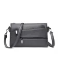 Borsa a tracolla grigia con motivo pelle di mucca, multitasche con zip, elegante e chic. - Grigio