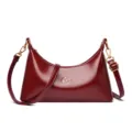 Wine red patent leather shoulder bag for women, chic hobo half moon purse with metal hardware. - Red