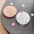 Detailed close-up of acrylic Mother's Day decorative discs with engraved blessing text. - Happy Mother's Day (06) / 5cm Diameter Style 06 / Silver