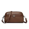 Brown leather crossbody phone bag for women, stylish double layer shell bag with metal logo. - Coffee