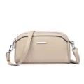 Beige leather crossbody phone bag with twin compartments and chic silver tone hardware. - Apricot