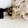 Close-up of golden acrylic 40th birthday cake topper with floral decor and gift box background. - 40th Style / 1 Piece