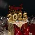 2025 New Year cake topper set with gold balloon number candles and red acrylic Happy New Year sign. - 250g Gold Cardstock Cake Borders 5 Pieces (12x45cm)