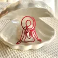 Red metal wire abstract art sculpture home decor or cake topper for creative party styling - Goddess Silhouette in Mirror Red