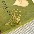 Gold metal abstract female figure cake topper detail, elegant silhouette dessert decoration. - Girl Back View Cake Topper in Gold
