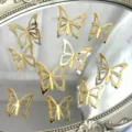 Goldene 3D Schmetterling Torte Topper Acryl hohle Schmetterling Dekorationen fuer Geburtstag Party - 10 Stück (Breite 3.8cm*5+Breite 4.5cm*5) / Gold