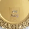 Acrylic transparent birthday cake topper detail shot showing silver Happy Birthday text. - Silver & Transparent Marked Base