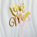 Detailed close-up of double-layer acrylic cake topper with gold Love Mom design for mom celebration. - Pink & Gold Flower I Love You Mom