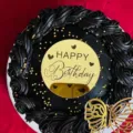 Close-up of the round gold acrylic Happy Birthday cake topper with elegant typography. - Round Marking 9 / Gold
