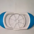 Blue and white plastic apple slicer and corer tool with stainless steel blades for kitchen. - Blue And White