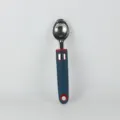 Stainless steel ice cream scoop kitchen gadget with ergonomic handle for baking and cooking detail view. - Ice Cream Spoon
