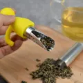 Yellow silicone humanoid tea infuser with stainless steel mesh strainer for loose leaf tea - Yellow
