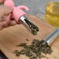 Pink silicone humanoid stainless steel tea infuser filter, creative portable loose leaf tool. - Pink