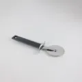 Stainless steel pizza cutter wheel with ergonomic grey handle and protective finger guard for kitchen. - Pizza Knife