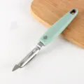 Stainless steel vegetable peeler with mint green handle, ergonomic kitchen fruit peeling tool. - Arch-Shaped Graters