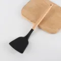 Spatola da cucina in silicone nero con manico in legno, utensile resistente. - Spatola Grande