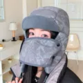 Close-up detail of winter warm trapper hat with integrated mask in grey camouflage style. - M (56-58cm) / Gray