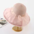 Detailed view of women pink organza sun hat with elegant pearls and bow beach wear. - M (56-58cm) / Pearl Full Crown Style - Pink