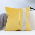 Detail shot of yellow velvet throw pillow featuring gold stripe and rhinestone mosaic band decor. - Yellow Rhinestones