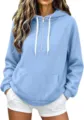 Close up detail of women's light blue quarter zip hooded sweatshirt showing soft fabric. - S / Sky Blue
