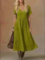 Green casual V-neck short sleeve pocket dress detail showing stylish loose fit and buttons. - Army Green