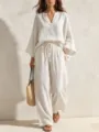 Casual linen two-piece outfit detail, featuring a stylish V-neck top and comfortable wide-leg pants. - S / Top And Bottom / White