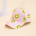 Pink baseball cap featuring playful yellow smiley face print, casual sun protection hat. - Pink and Yellow Smiley Face