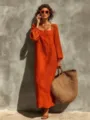 Entdecken Sie dieses elegante einfarbige Langarm-Maxikleid fuer den perfekten Herbststil. - S / Orangerot