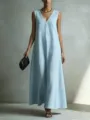 Close-up detail of the elegant light blue sleeveless V-neck maxi dress fabric and design. - Sky Blue