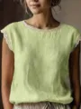Close-up detail of vintage lace trim crewneck sleeveless linen top, casual solid color style. - Grass Green