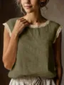 Detail of vintage sleeveless top with delicate lace trim on crewneck and arm openings. - Army Green