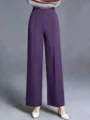 Hochgeschnittene weite Hose Detailansicht mit Frontfalten und violetter Stoffstruktur. - XS / Lila