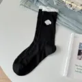 Calcetines negros de tubo medio de algodón con bordado de perrito y borde de volantes. - Talla única / Negro