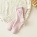 Cozy pink fuzzy winter socks for women featuring a sweet bow embroidery. Soft warm home sleep socks. - Pink Purple