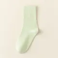 Light green solid color crew socks for women, comfortable daily wear cotton socks. - One Size / Light Green