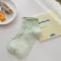 Light green solid color mid-tube socks, comfortable casual cotton socks for women daily. - One Size / Light Green