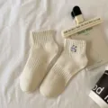 Women's short cotton socks with cute panda embroidery, breathable and comfortable design. - Panda on the Back / Beige