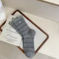 Grey striped mid-tube socks with metal charm, comfortable cotton casual socks for daily wear. - Medium Grey