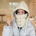 Detail view of the warm fleece-lined winter hooded balaclava windproof mask for outdoor riding. - Buckle Style / Beige