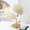 Straw sun hat for women summer beach vacation wide brim with pearl lace bow white variant - M (56-58cm) / JS3203 Beige