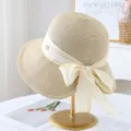 Zomerse stro zonnehoed met elegant striklint, perfecte strand zonbescherming emmerhoed. - M (56-58cm) / Beige