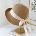 Zomer strohoed voor vrouwen met polkadot strik, grote rand zonnehoed voor strand vakantie. - M (56-58cm) / koffiekleur