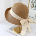 Dames zomer strohoed met brede rand en striklint strand zonbescherming vissershoed variant - M (56-58cm) / koffiekleur