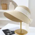 Vrouwen zomer grote rand strohoed met witte strik zonbescherming strand zonnescherm hoed - M (56-58cm) / Beige